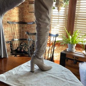 Stuart Weitzman white suede boots, over the knee, scrunching at the ankle
